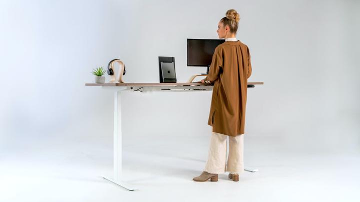 woman working at standing desk
