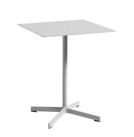 A white table with a square top and a white base on a white background.