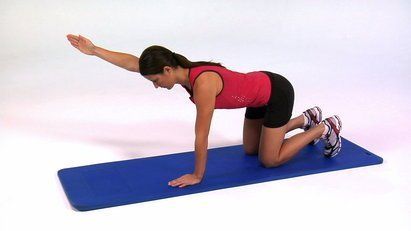 Figure 5: Quadruped with arm reach: start (left); finish (right). The athlete activates her deep neck flexors and core stabilizers and reaches out with one arm without any shifting or loss of alignment.  