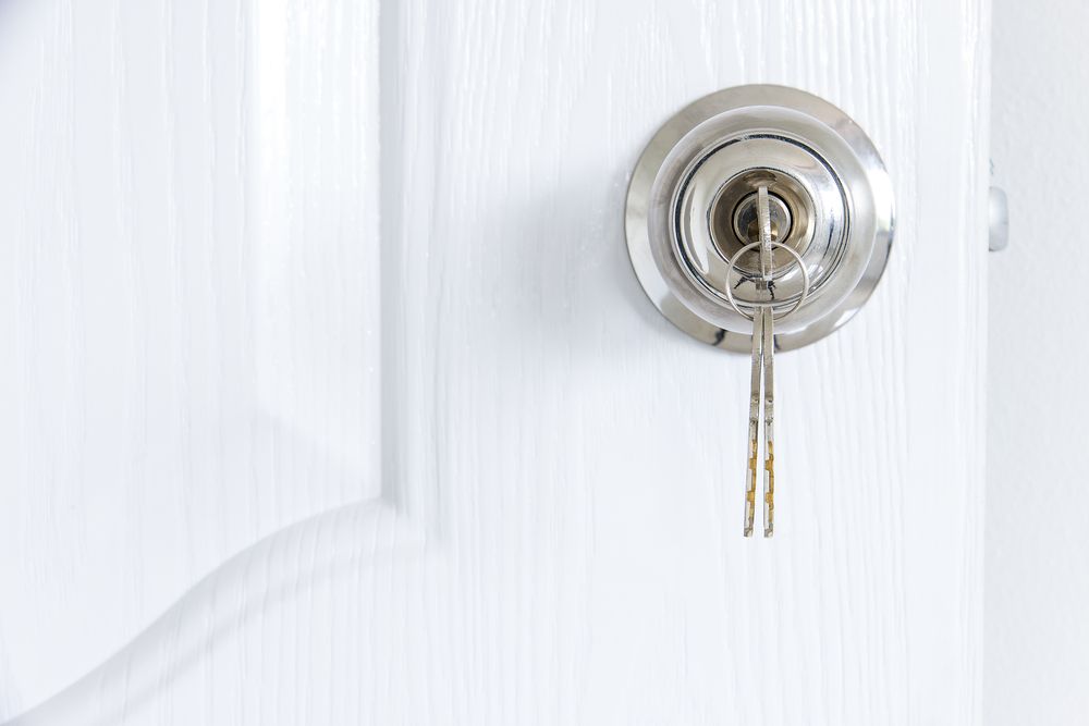 Key At The White Door Of The House — New Lock & Safe Services in Warrnambool, VIC