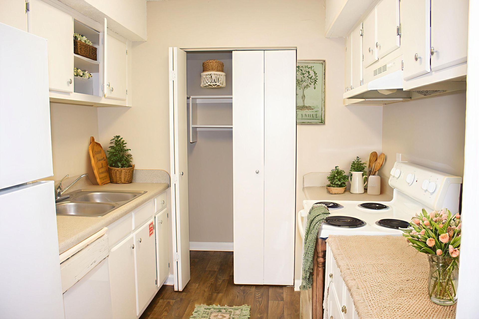 Galley kitchen with washer and dryer closet or pantry 