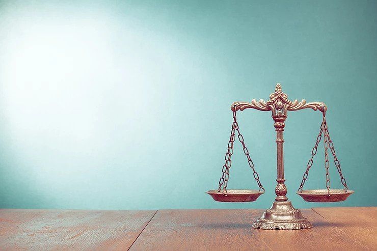 Weight Scale of Justice — Cleburne, TX — Bradley Law Firm