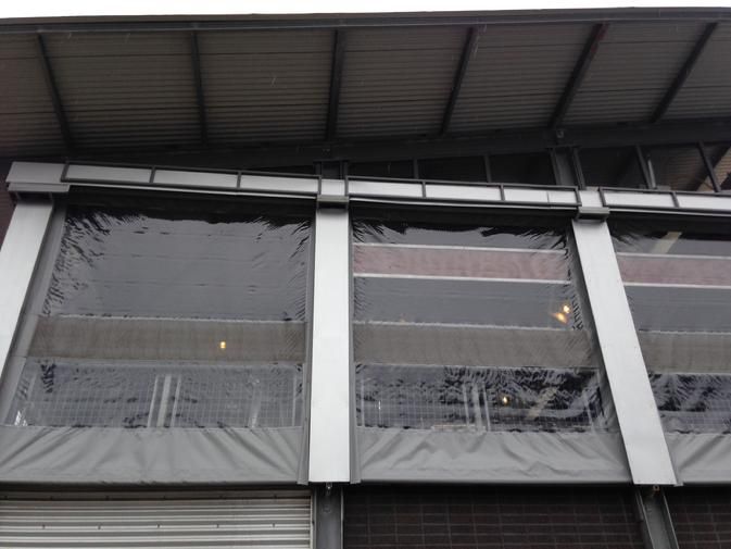 a building with a lot of windows and a roof