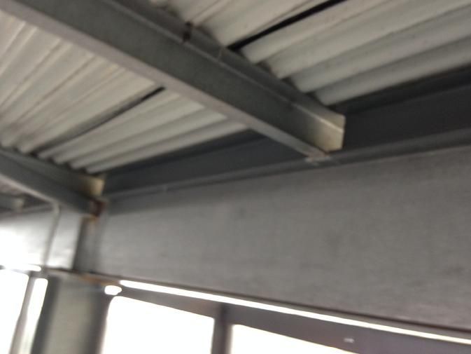 a close up of a ceiling with a few windows