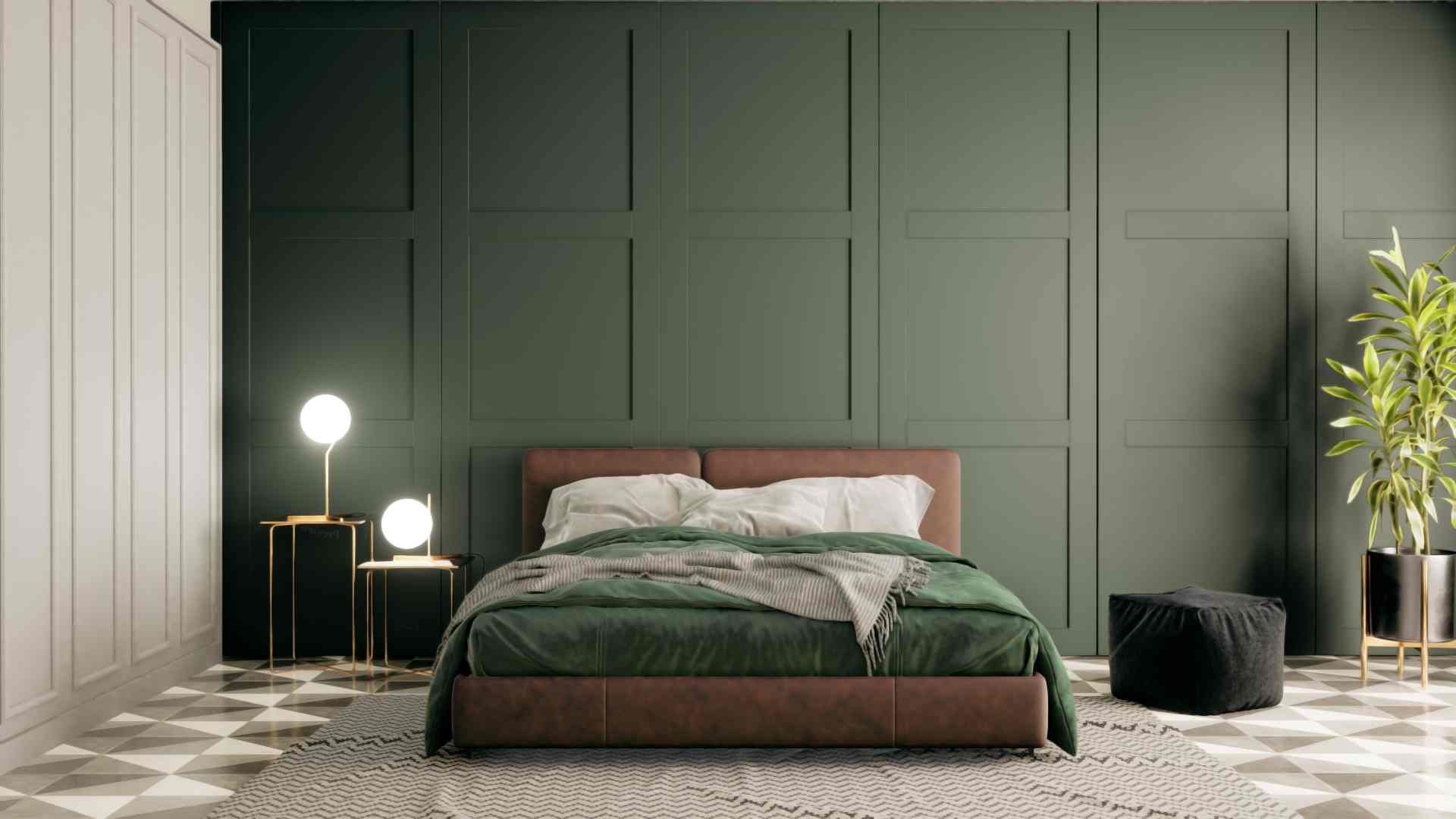 A dark green-themed modern bedroom with ambient lighting and a greenery plant in the space  at The B