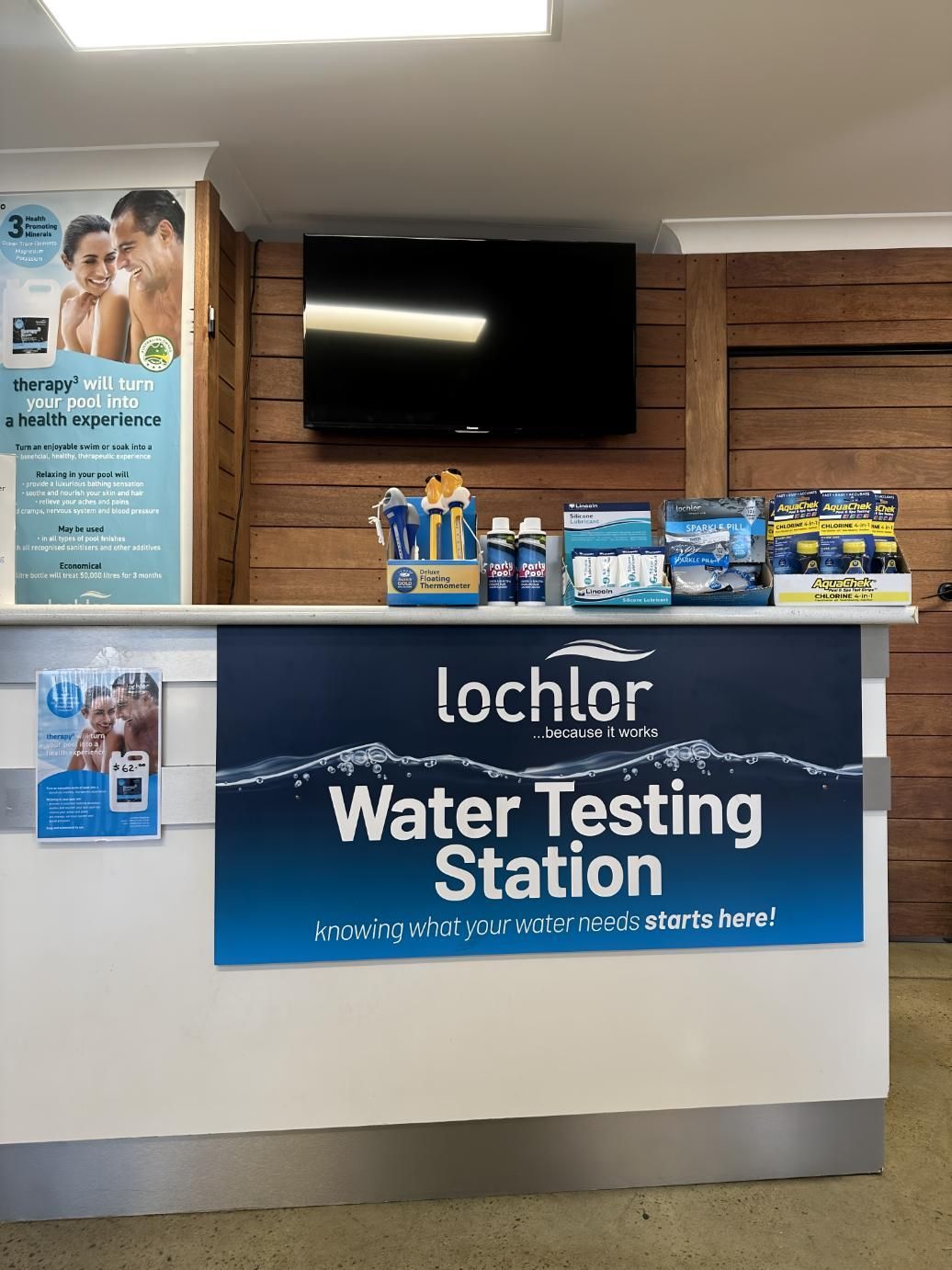Lochlor Water Testing Station With a Sign on the Counter — Tweed Pool Shop in Tweed Heads South, NSW