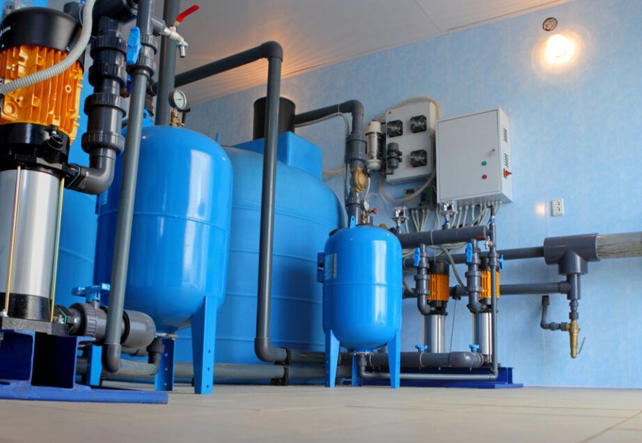 A Room With a Lot of Blue Tanks and Pipes — Tweed Pool Shop in Casuarina, NSW