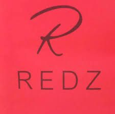 A red shirt with the word redz on it.