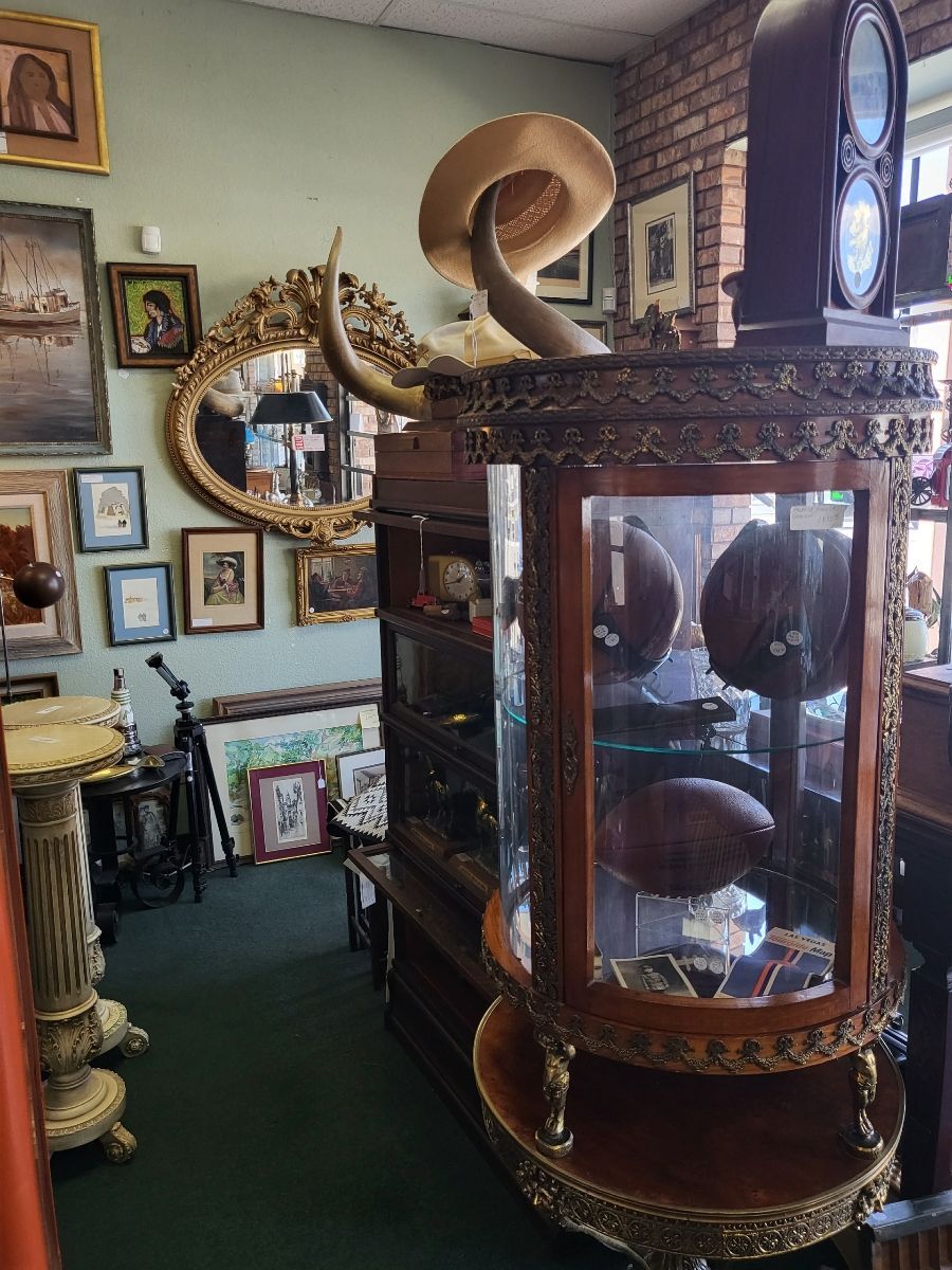 Wooden cabinet with white dishes