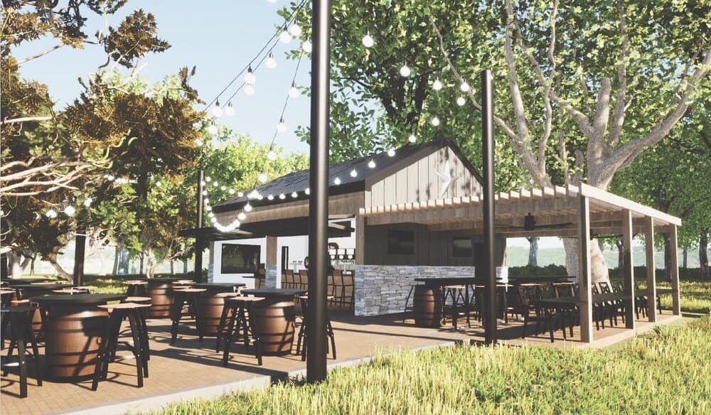 A rendering of a restaurant with barrels and tables in a park