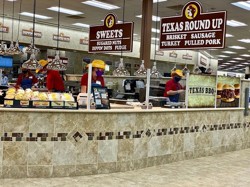 A grocery store with a sign that says texas round up