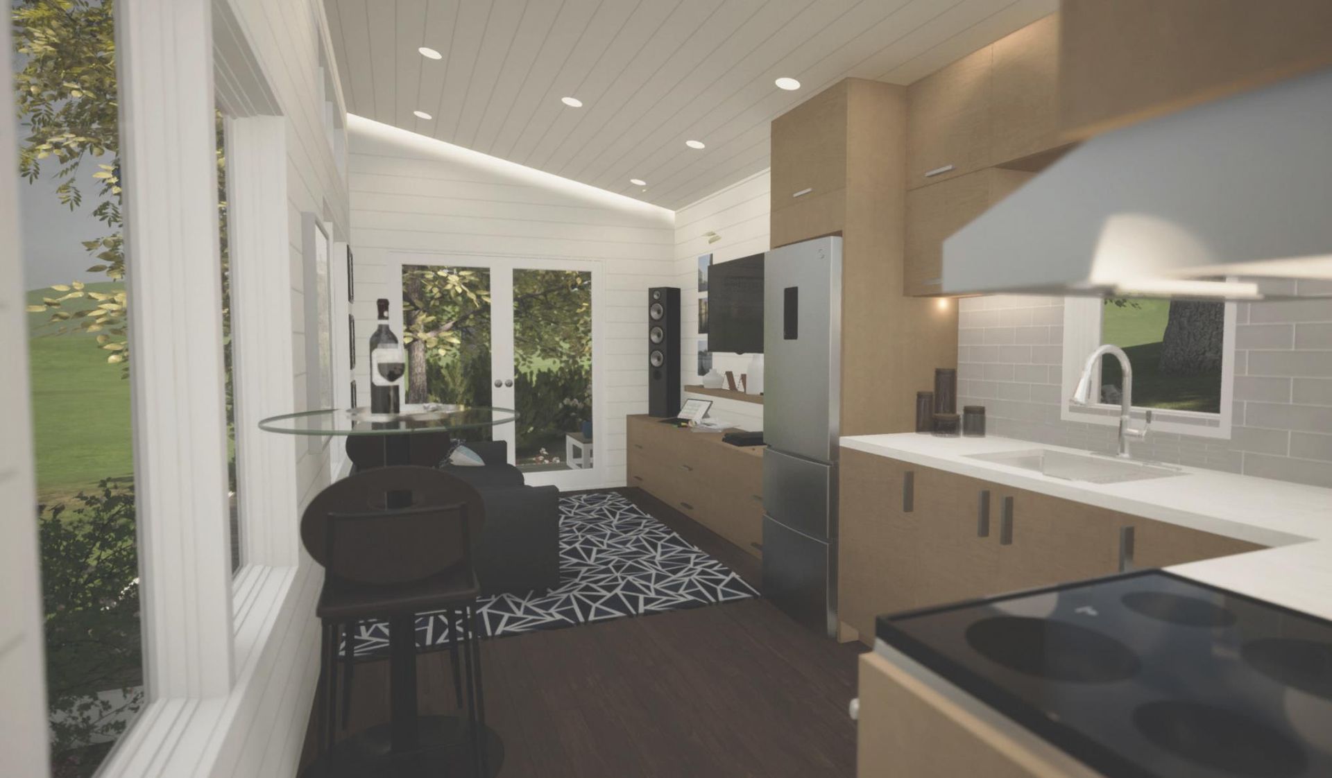 A modern kitchen and living area with tan cabinetry, stainless steel appliances, and a black and white patterned rug. Glass doors lead to a backyard view.