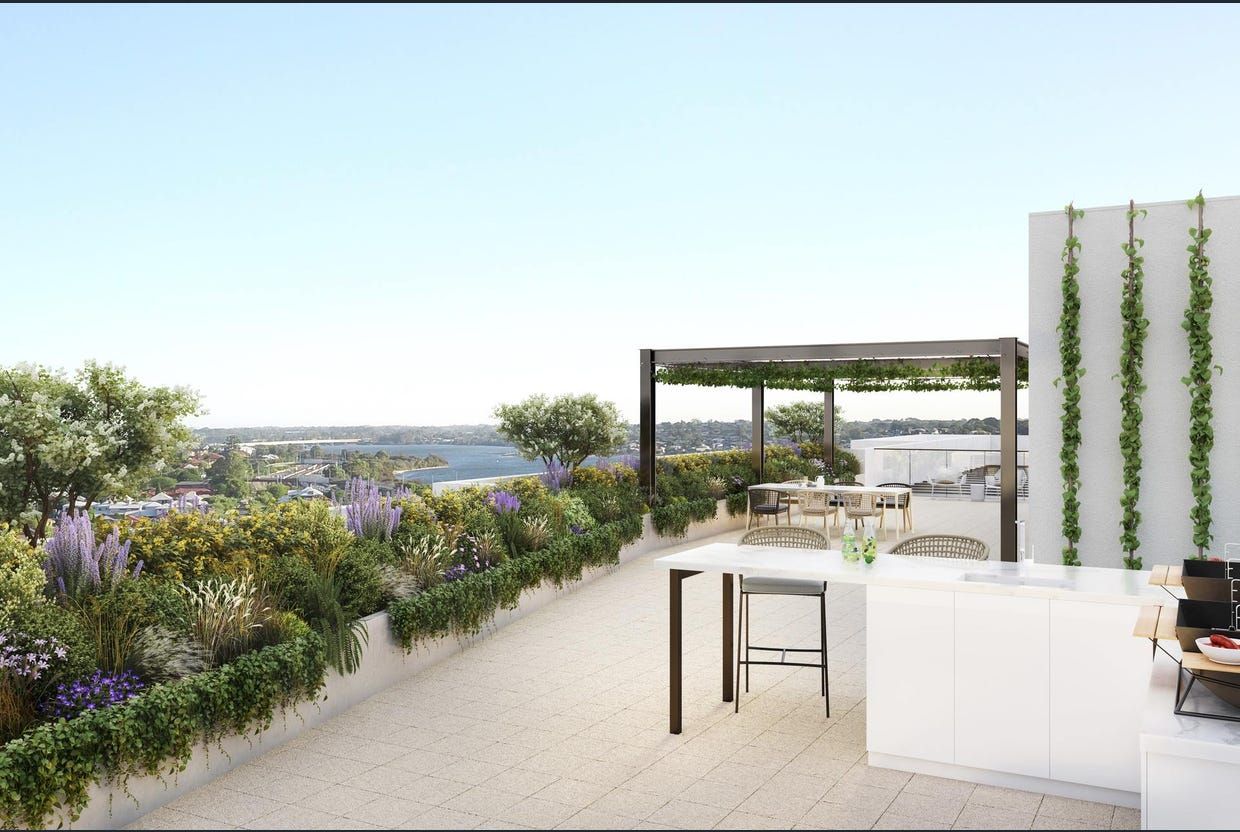 An artist 's impression of a rooftop terrace with a table and stools at Ilios Living in Como
