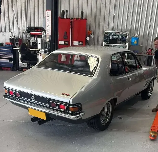 Silver Car Being Serviced in a Garage — Level Up Automotive In Unanderra, NSW