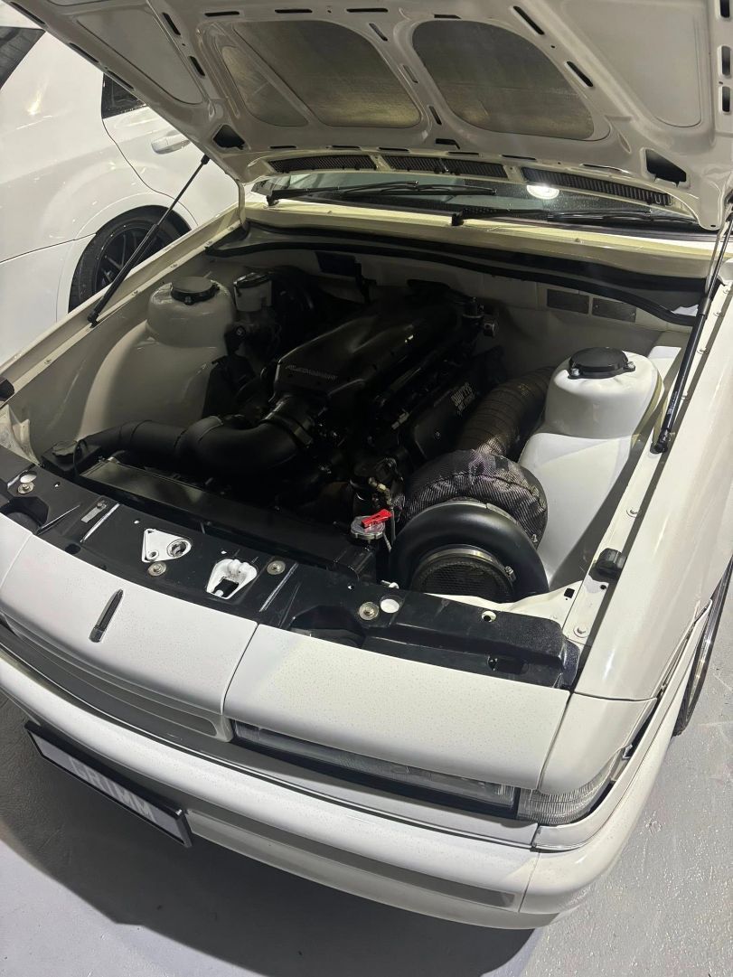 White Car with The Hood Open — Level Up Automotive In Figtree, NSW