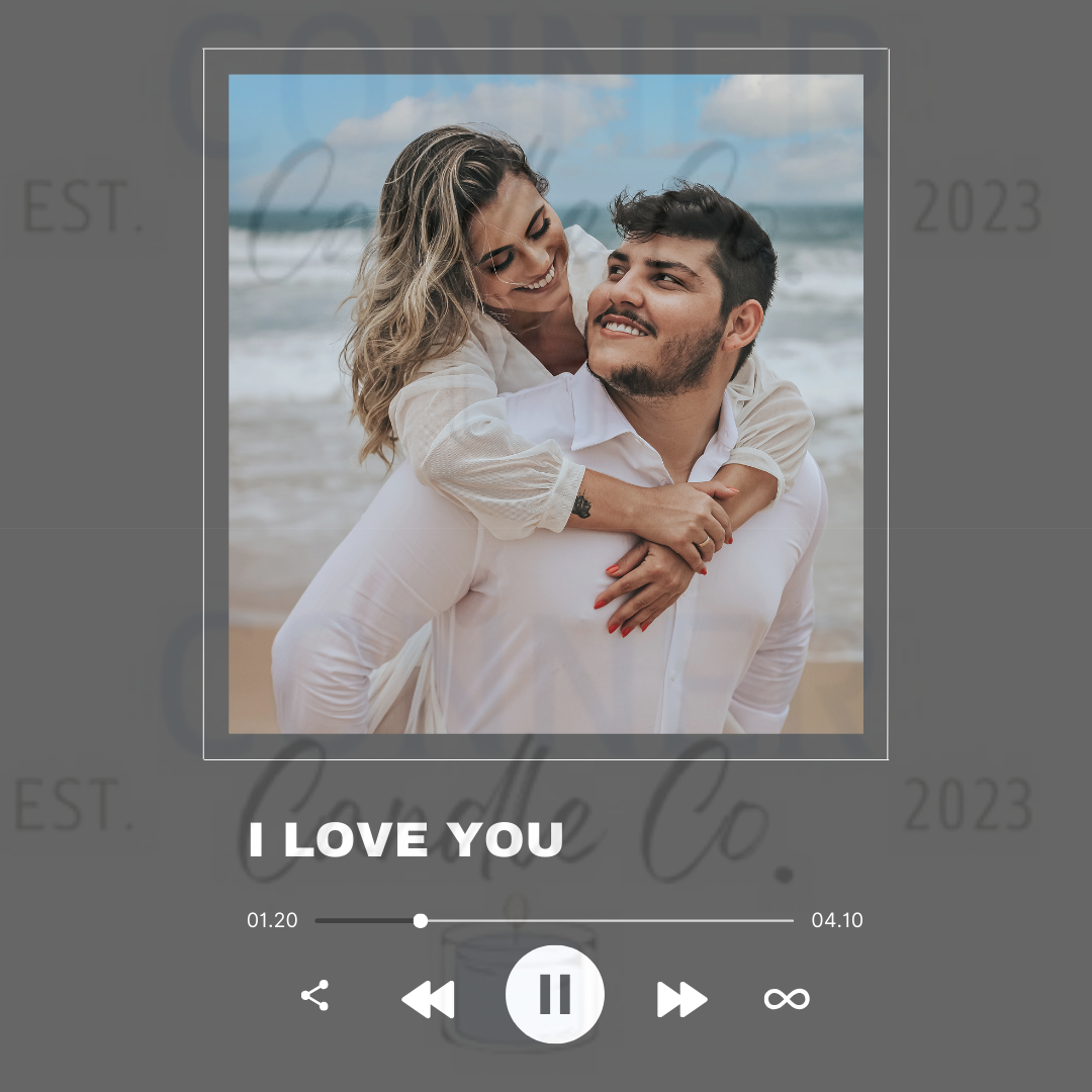 Couple on beach, woman embracing man. 