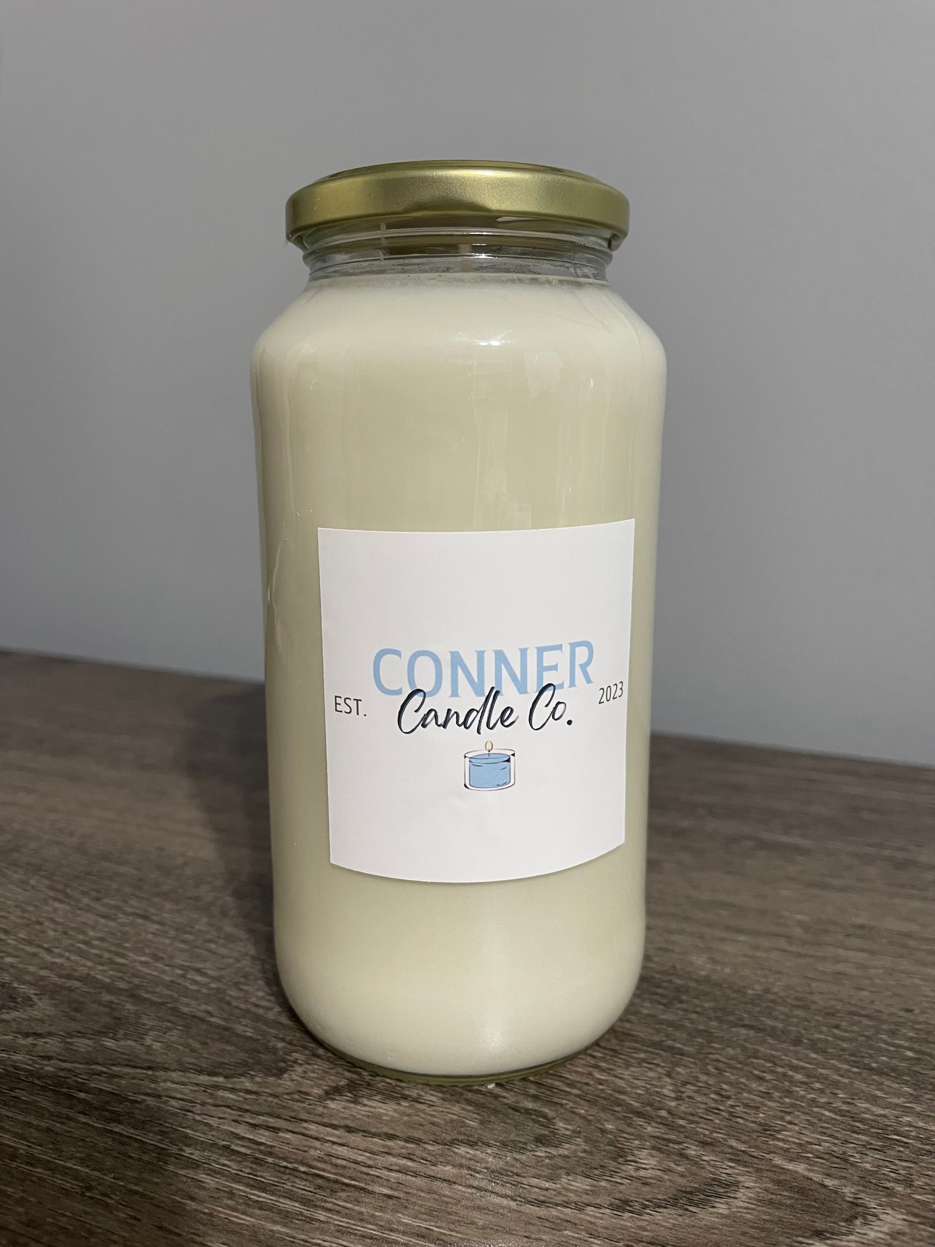 Jar of white liquid with a label that says 