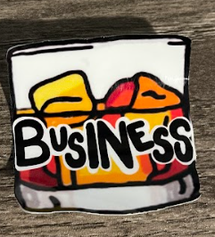 A drink in a glass with the word 