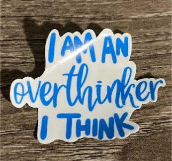 White sticker with blue text: 