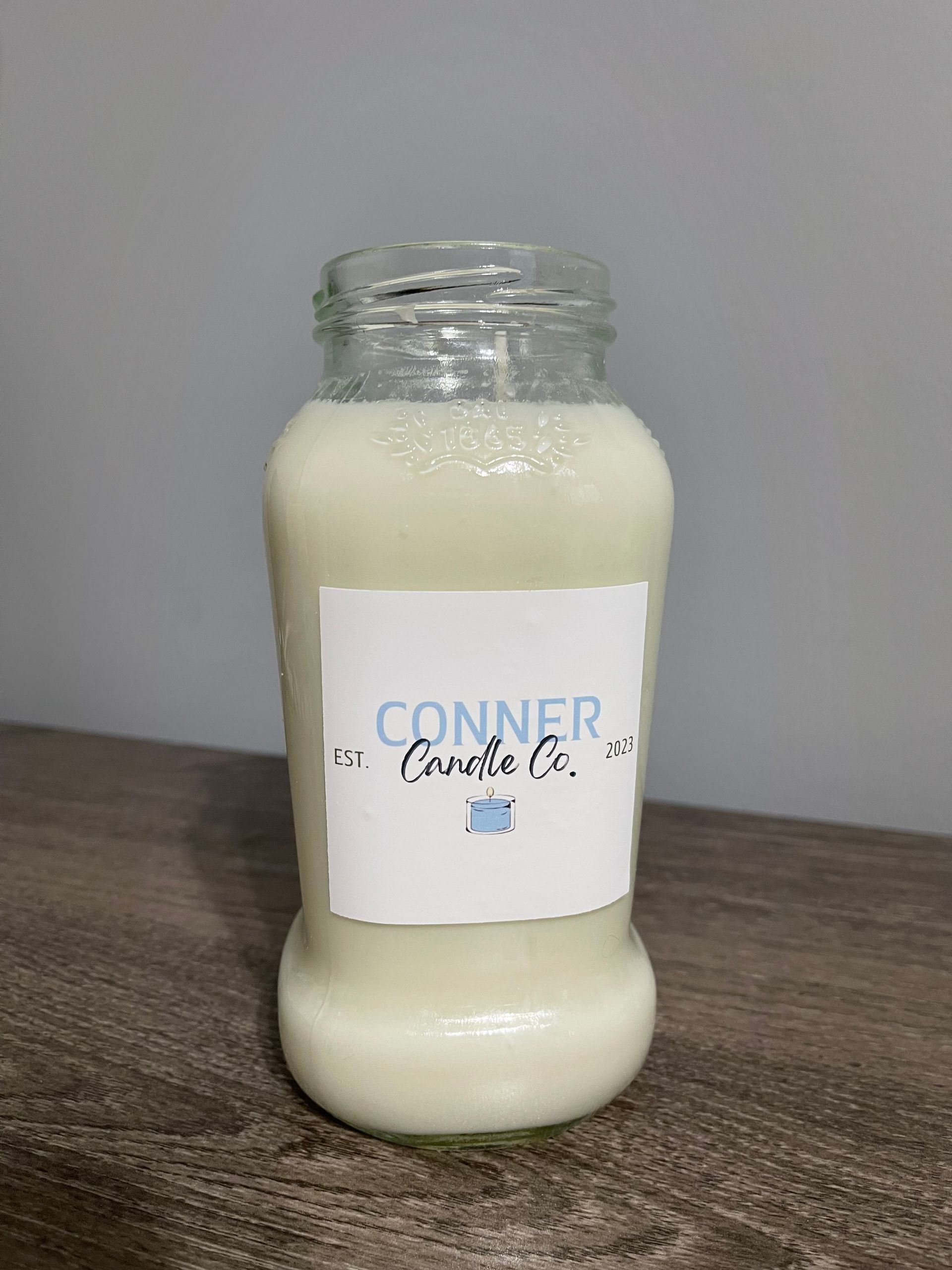 A jar candle with a label that says 