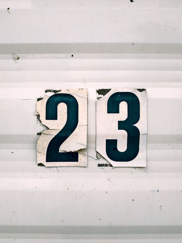 White sign with number 
