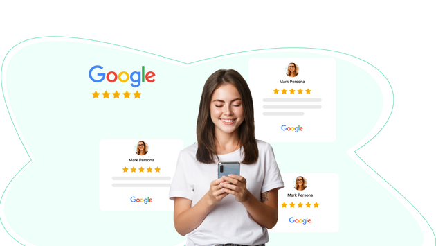 A woman is holding a cell phone in front of a google logo.