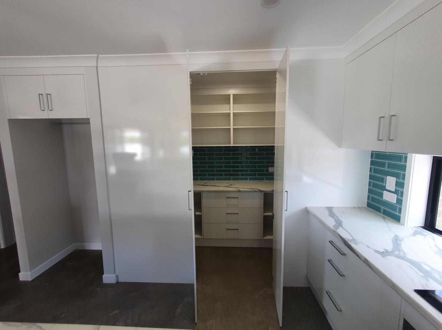 A Kitchen with Cabinets and A Pantry — Custombuilt Furnishers in Svensson Heights, QLD