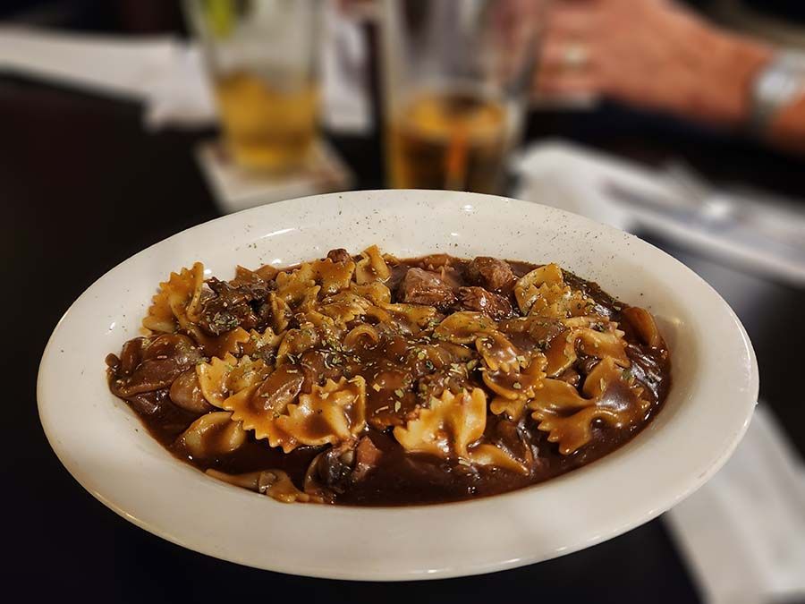 Beef Tips over Bow Tie Pasta