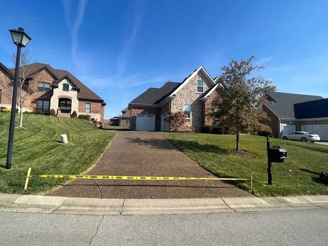 A Brick House with Driveway. - Bourbon City Softwash - Louisville, KY