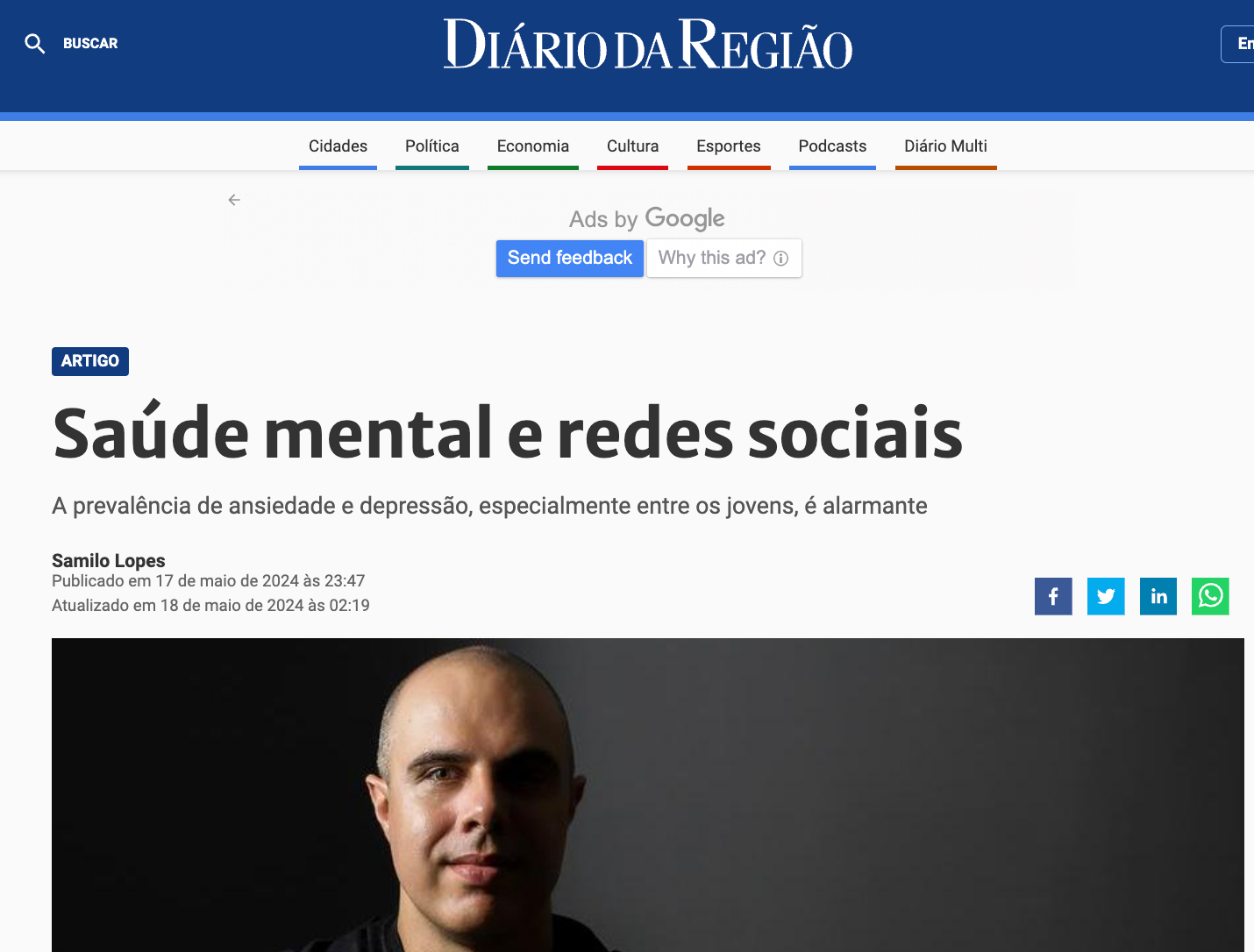 Um homem aparece na primeira página de um jornal.