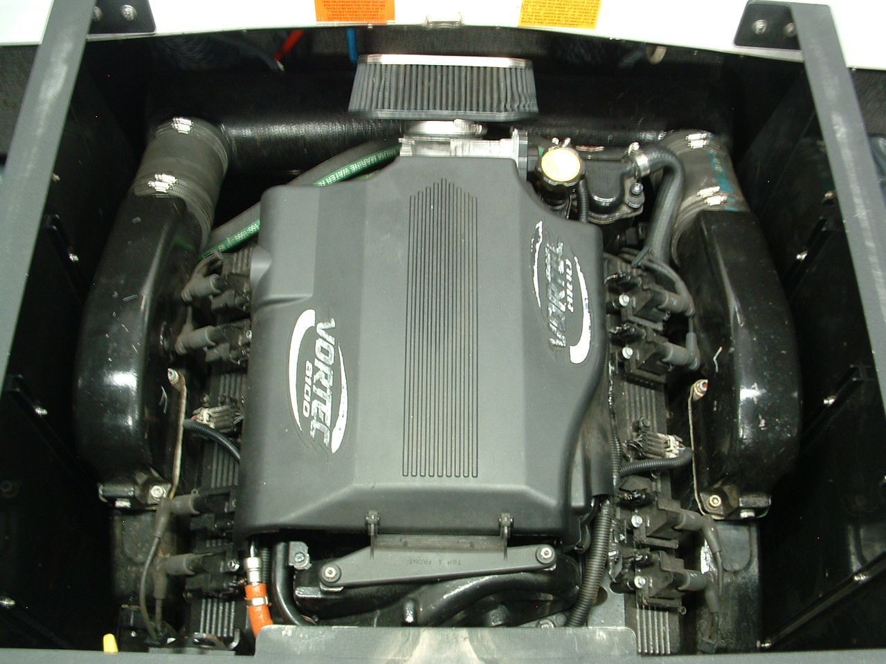 A vortex engine sits in the trunk of a boat