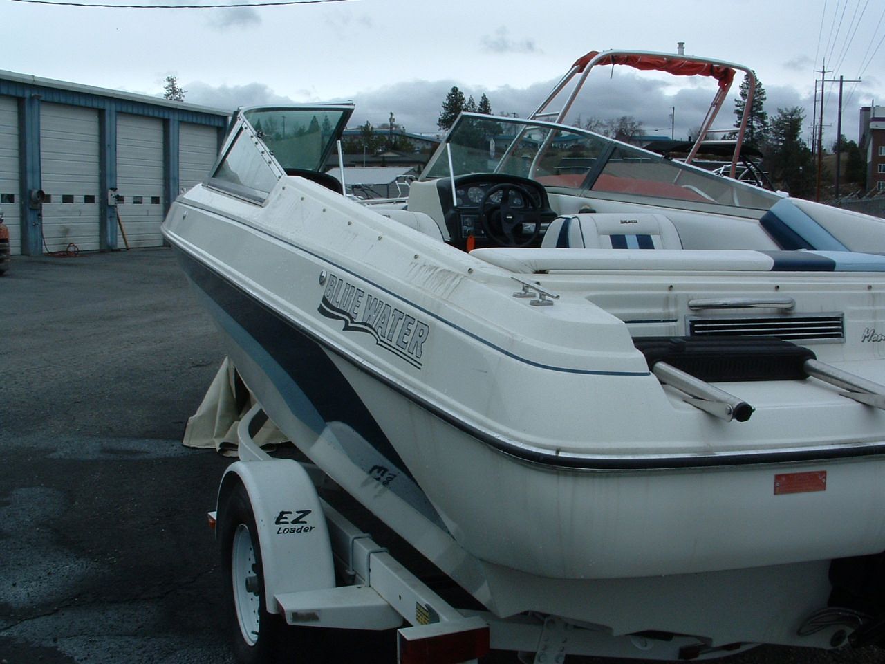 A boat on a trailer that says snapper on the side