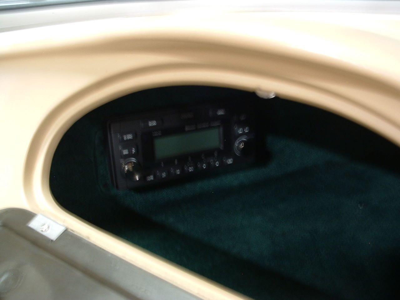 The inside of a car with a radio in it