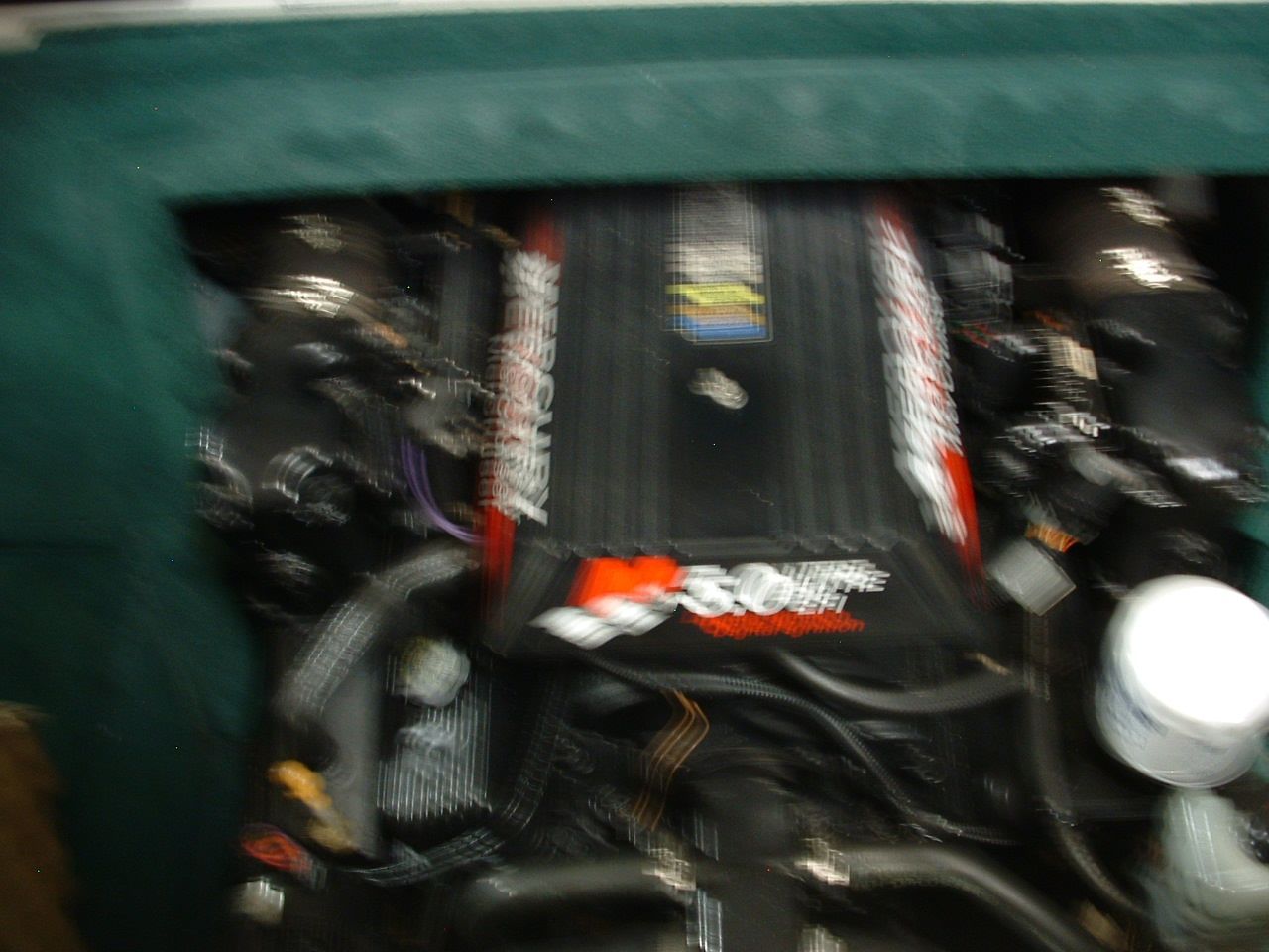 A close up of a mercruiser engine on a boat