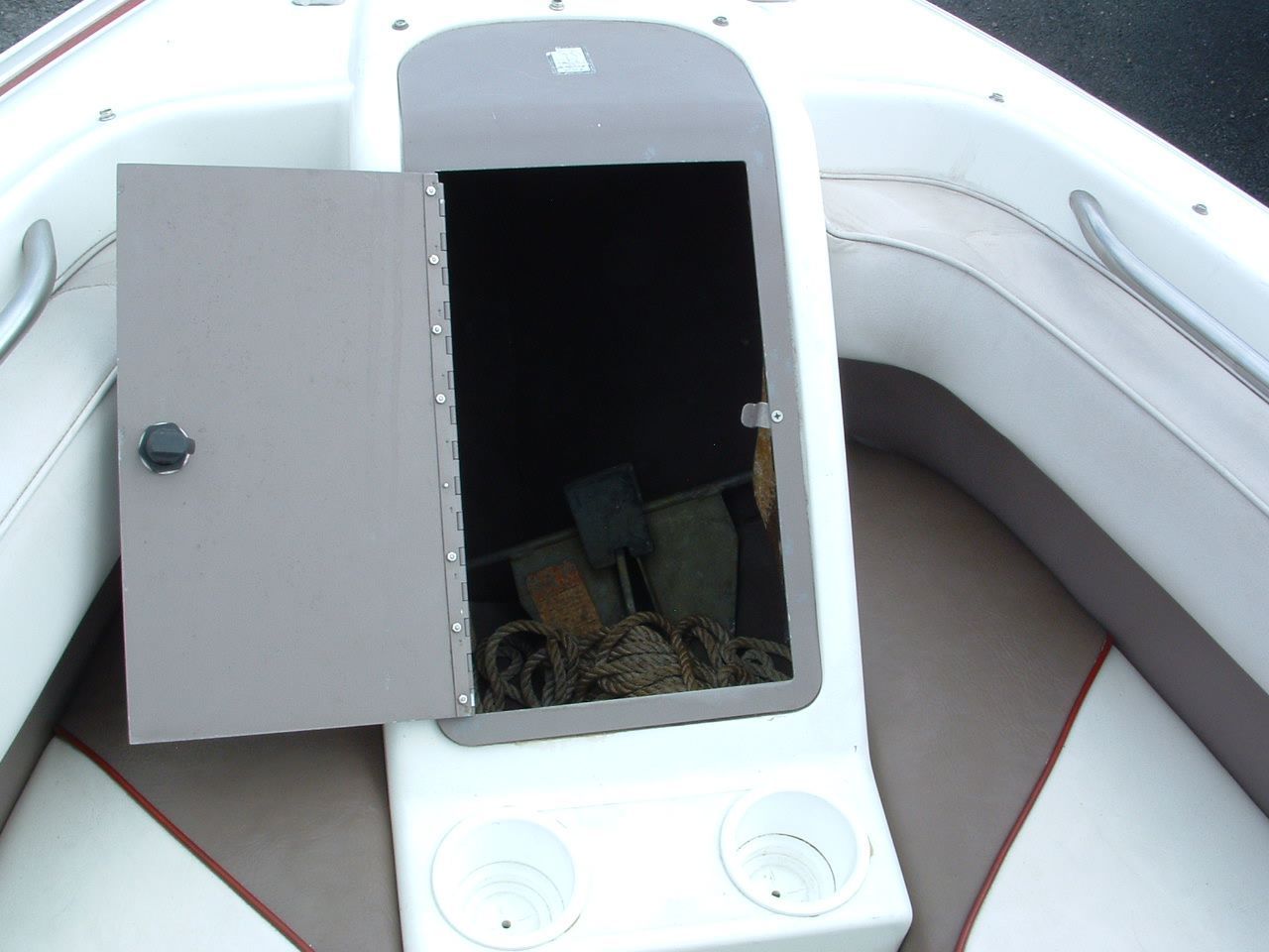 The inside of a boat with the door open