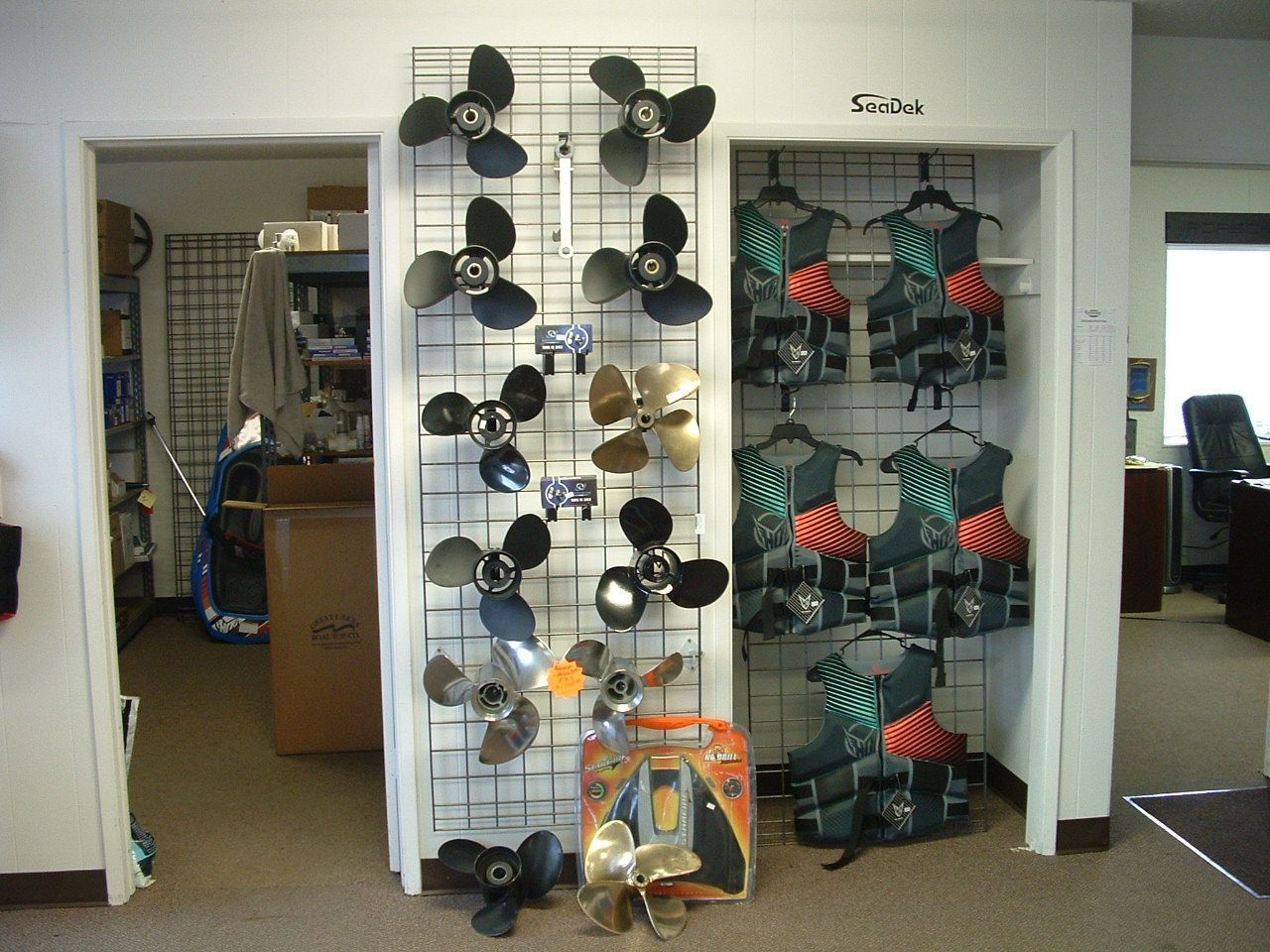 A display of propellers and life vests in a store