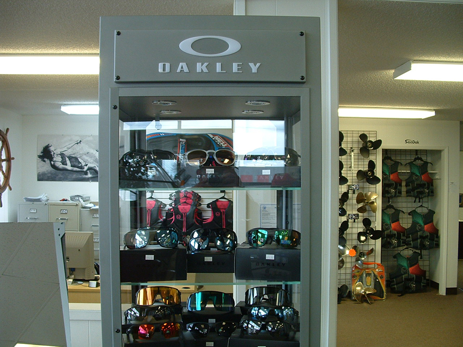 A display of oakley sunglasses and goggles in a store
