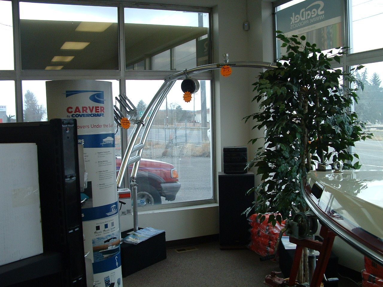 A room with a carver sign on the wall