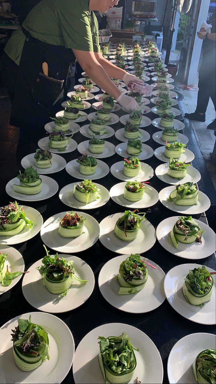 Avocado and egg salad served with feta cheese and balsamic reduction, plated elegantly