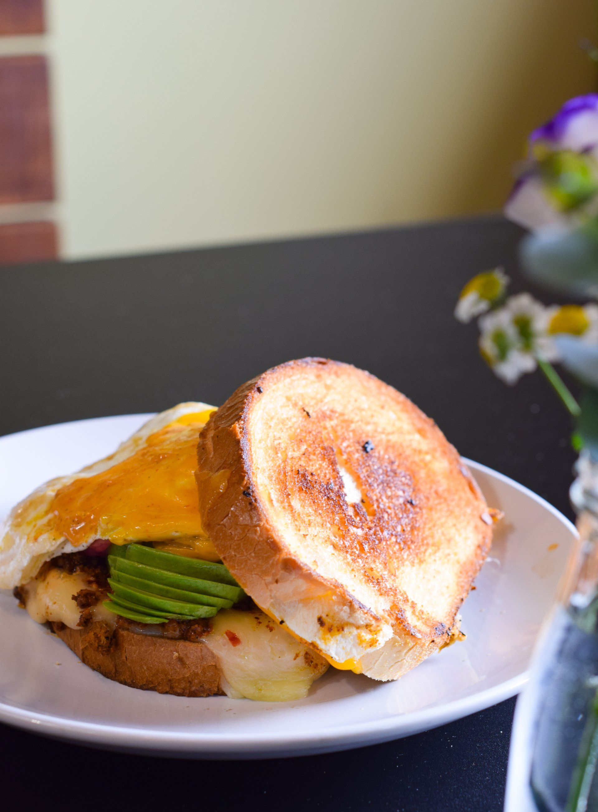A close up of a sandwich on a plate on a table