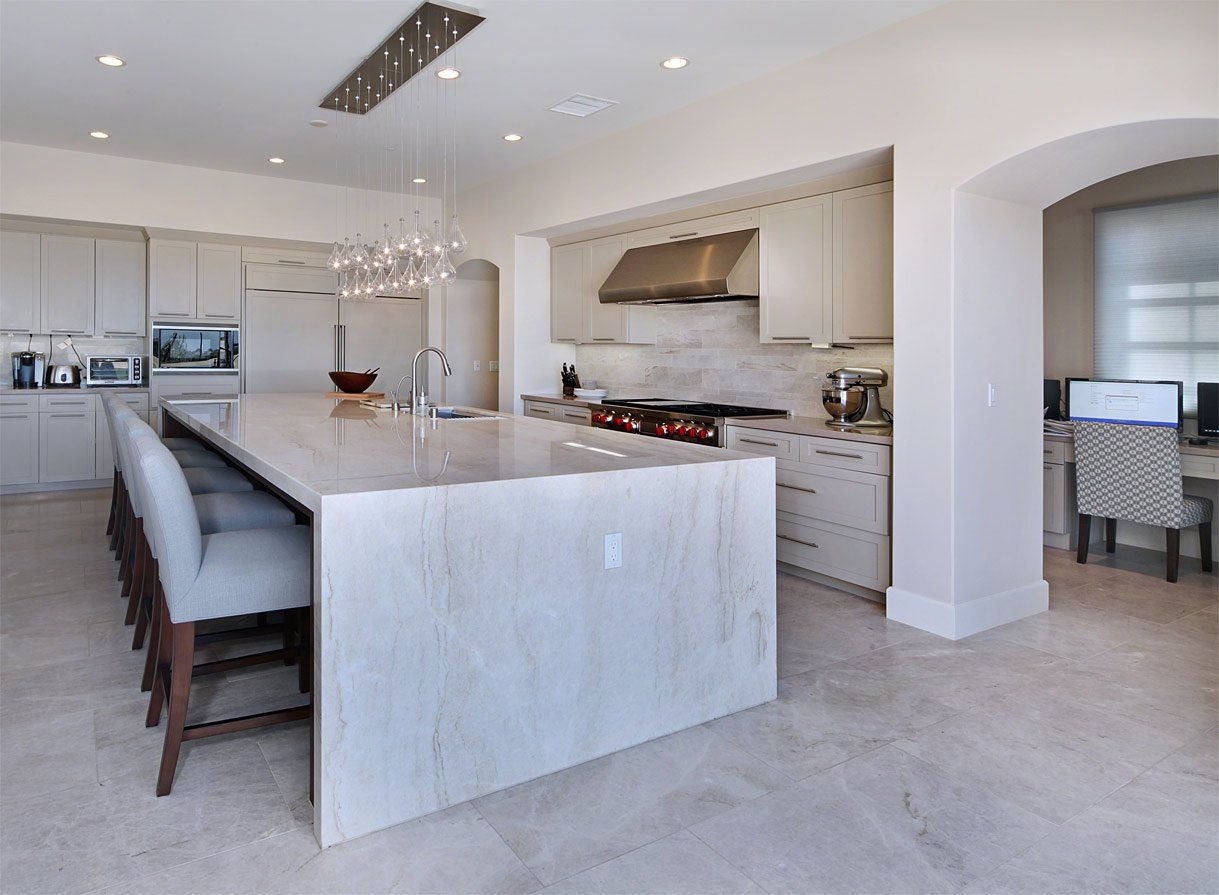 Quartzite Countertops — White Table and Chair in Modesto, CA