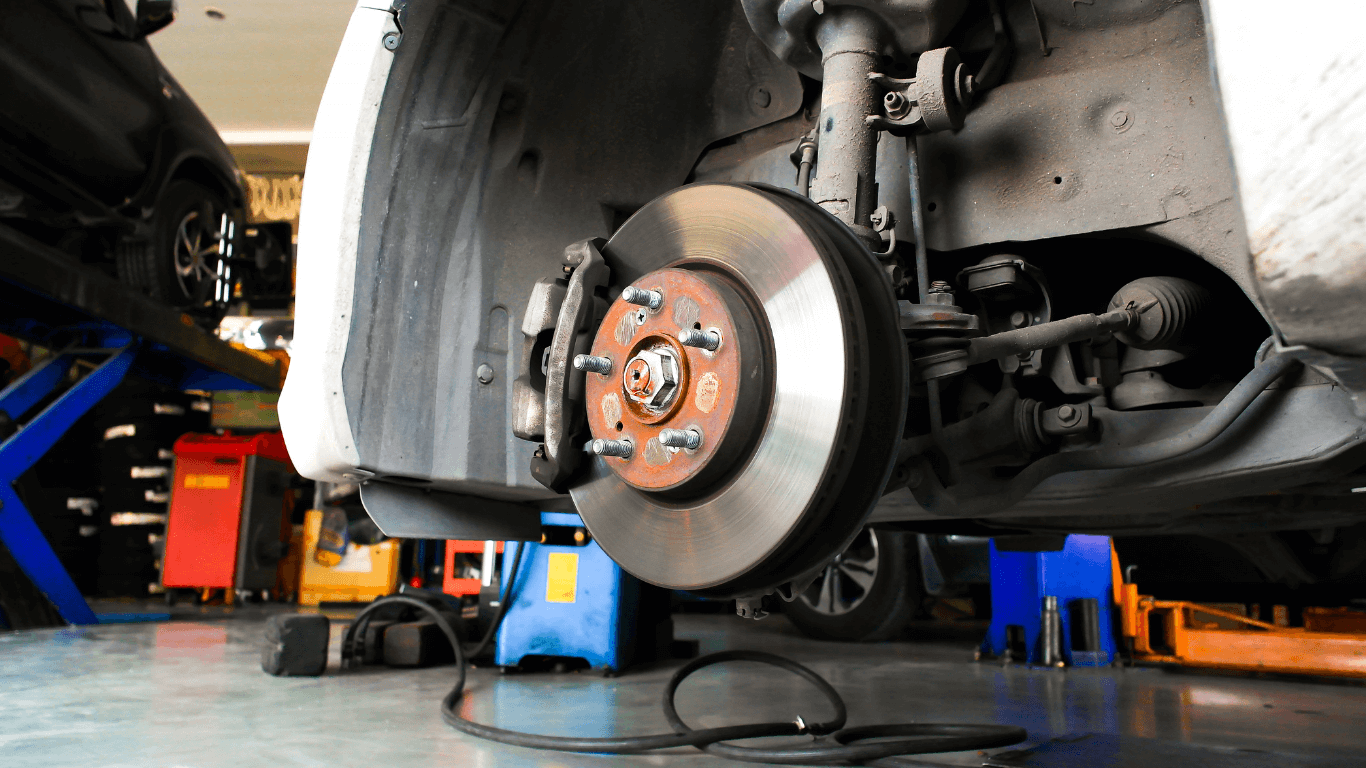 a mechanic doing a brake service