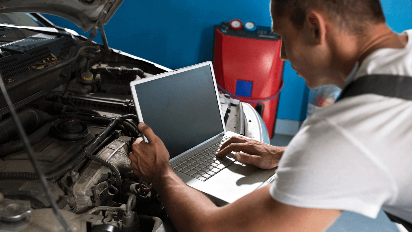a mechanic doing a car diagnostic evaluation