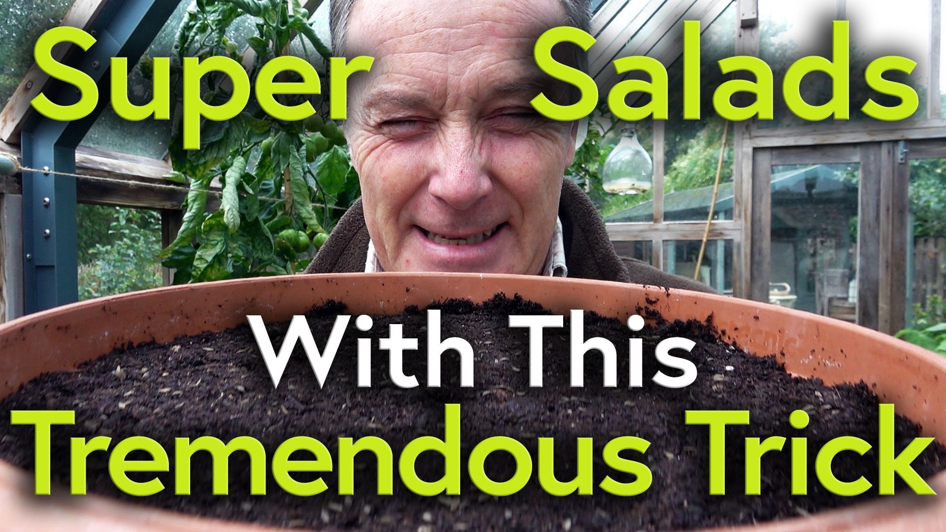 A bowl of compost with seeds on the surface close up to camera at the bottom of the image as Martin holds it up to his face and squints across it to try to see the seed distribution. The text Super Salads with this tremendous trick in green and white.