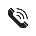 A black and white icon of a telephone with waves coming out of it.