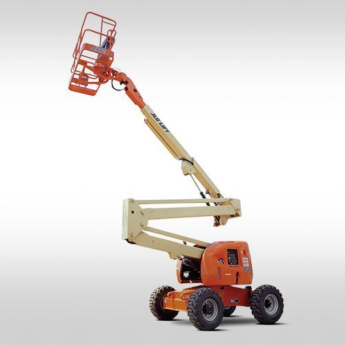 A jlg aerial lift is sitting on top of a white surface.