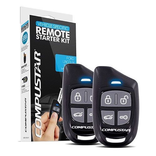 A person is holding a remote control in front of a box.