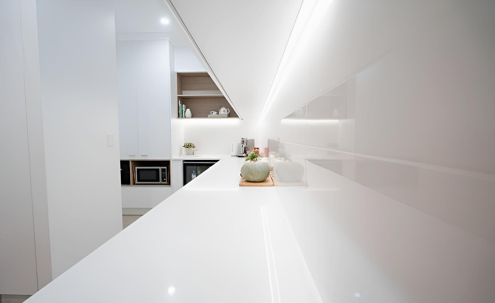 A Kitchen With a White Counter Top and a White Wall — CK Cabinetry in Coolum Beach, QLD