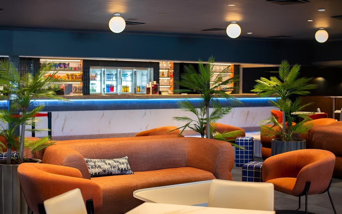 A Living Room With a Couch, Chairs, and a Table — CK Cabinetry in Coolum Beach, QLD