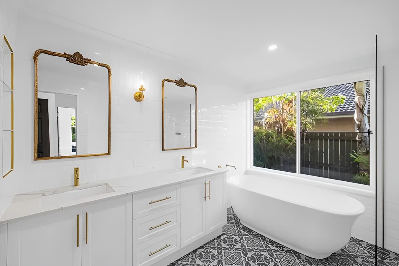 A Bathroom With Two Sinks, a Tub, Two Mirrors and a Window — CK Cabinetry in Coolum Beach, QLD